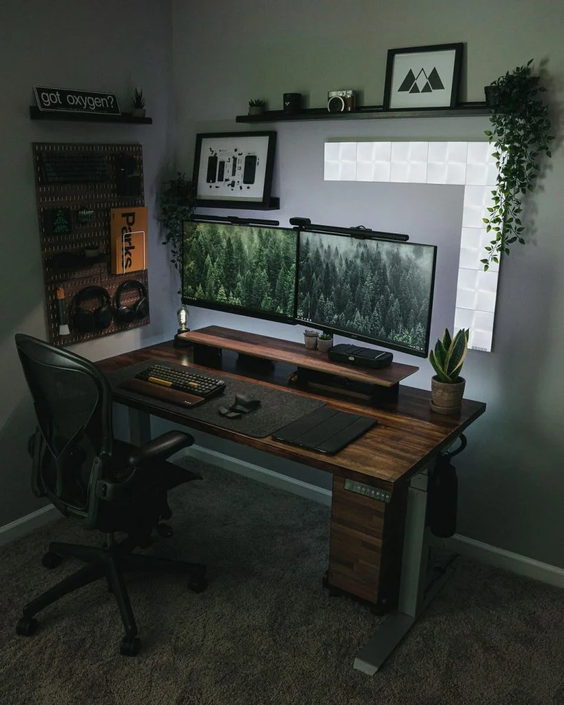 Professional workspace setup with multiple monitors and ergonomic desk